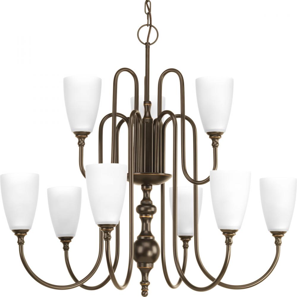 Nine-light, two-tier chandelier finished in antique bronze with etched glass.